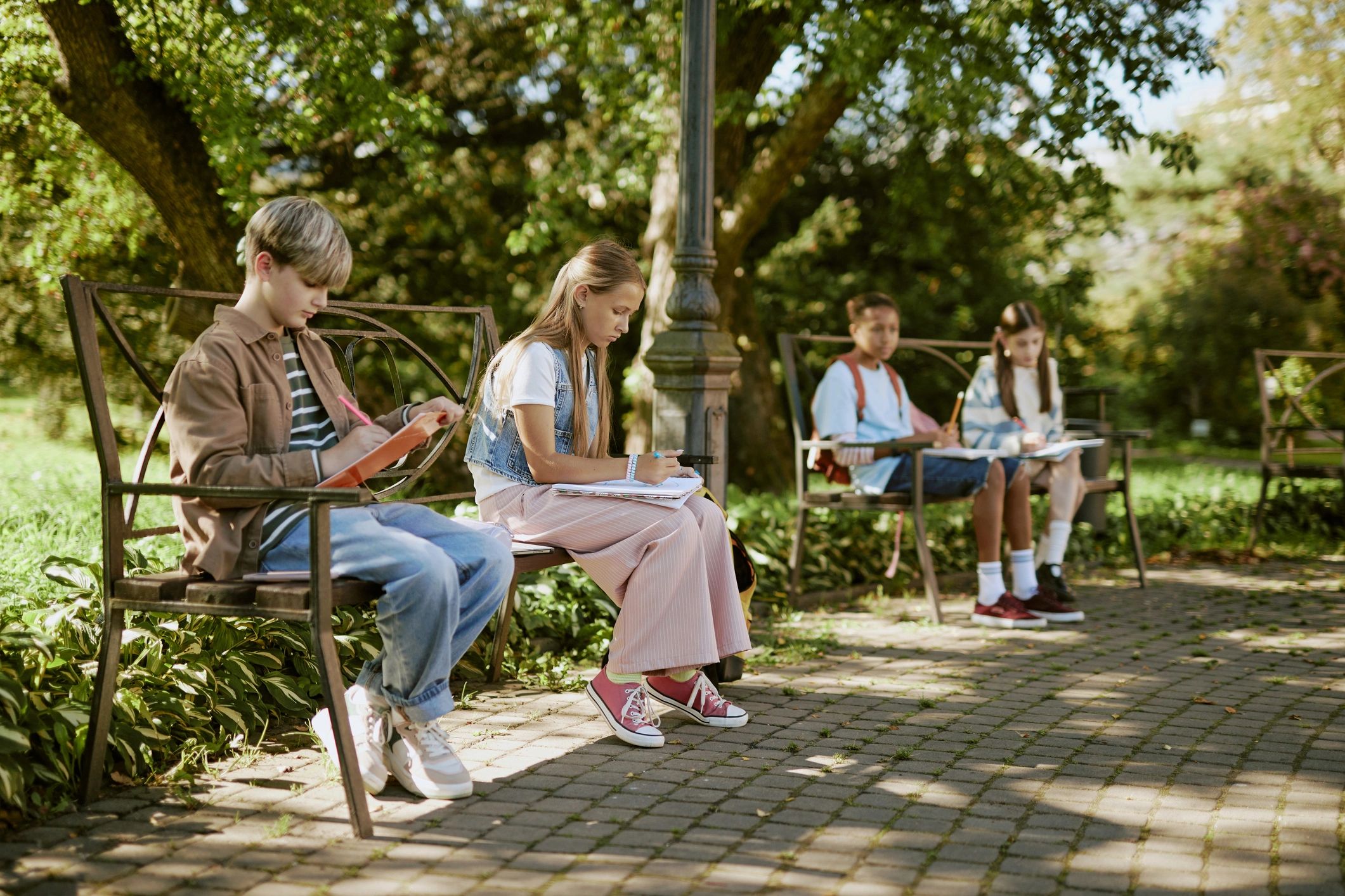 Students participating in outdoor creative learning together