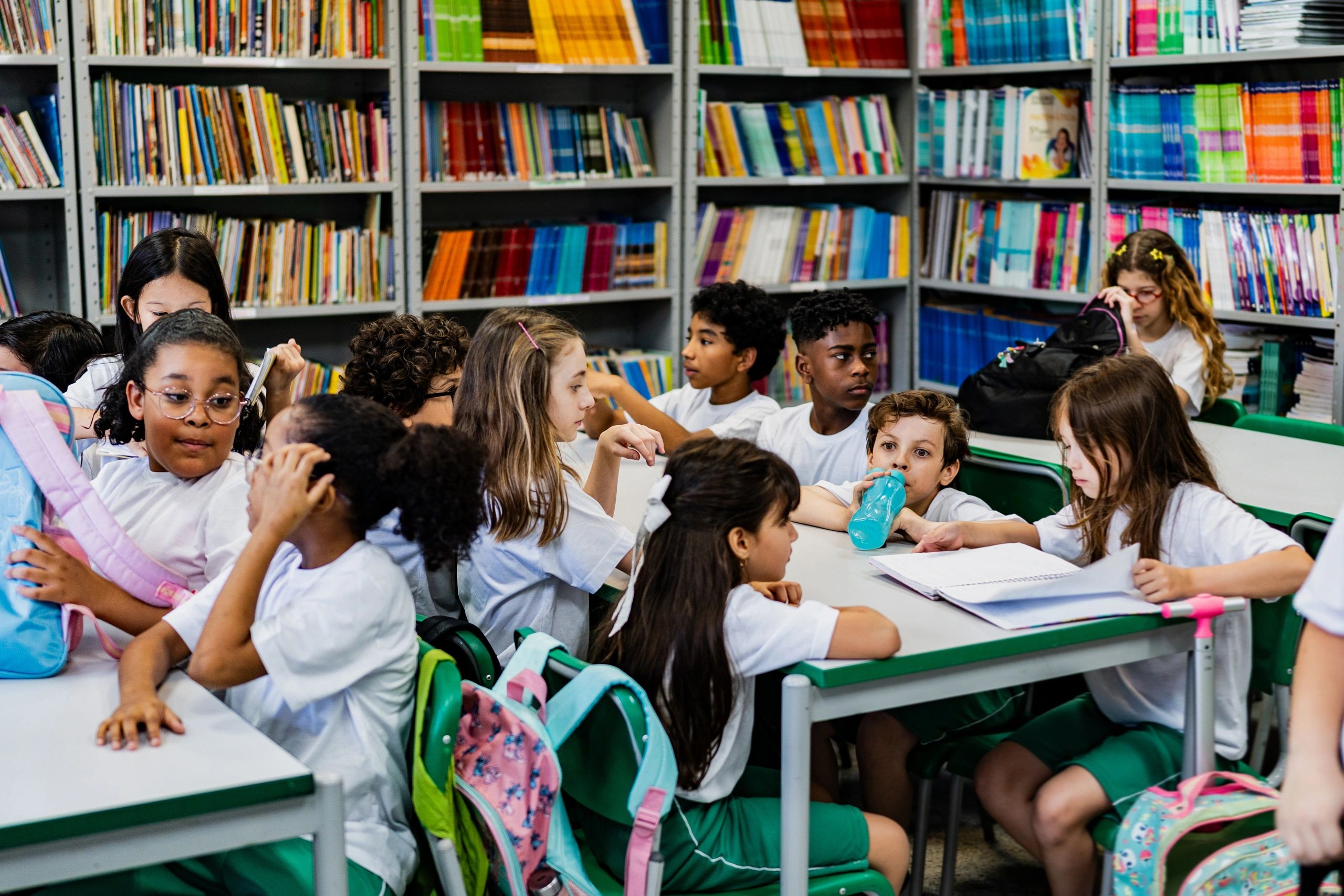 Elementary students gathered in a school library